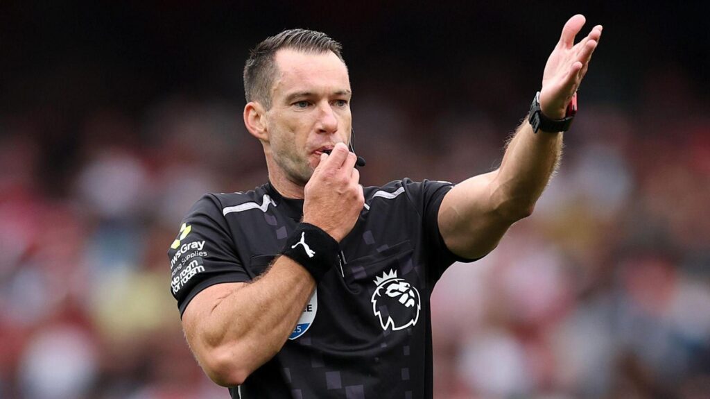 Referee Jarred Gillett