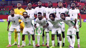 Nigeria players line up for a team photograph before a game