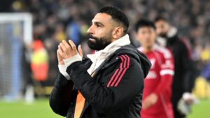 Mohamed Salah applauds Liverpool supporters after draw at Leeds