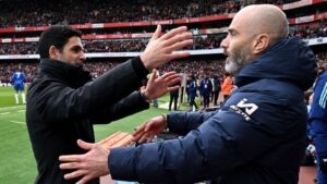 Mikel Arteta and Enzo Maresca hug at the Emirates Stadium in March 2025