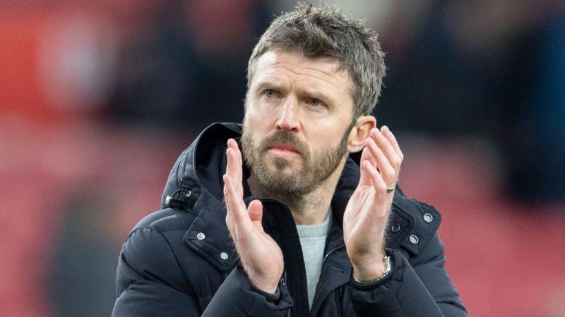 Michael Carrick claps his hands