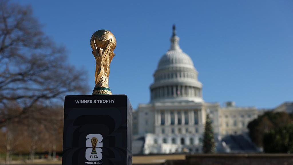 The World Cup trophy in front of the White House