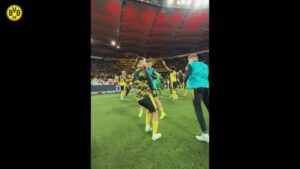 Dortmund Players Join Traveling Fans in Celebrating Victory at Stuttgart